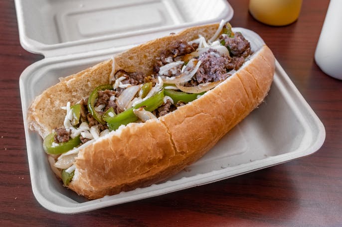 Order 8" Philly Cheese Steak food online from LA Pizza store, Victorville on bringmethat.com