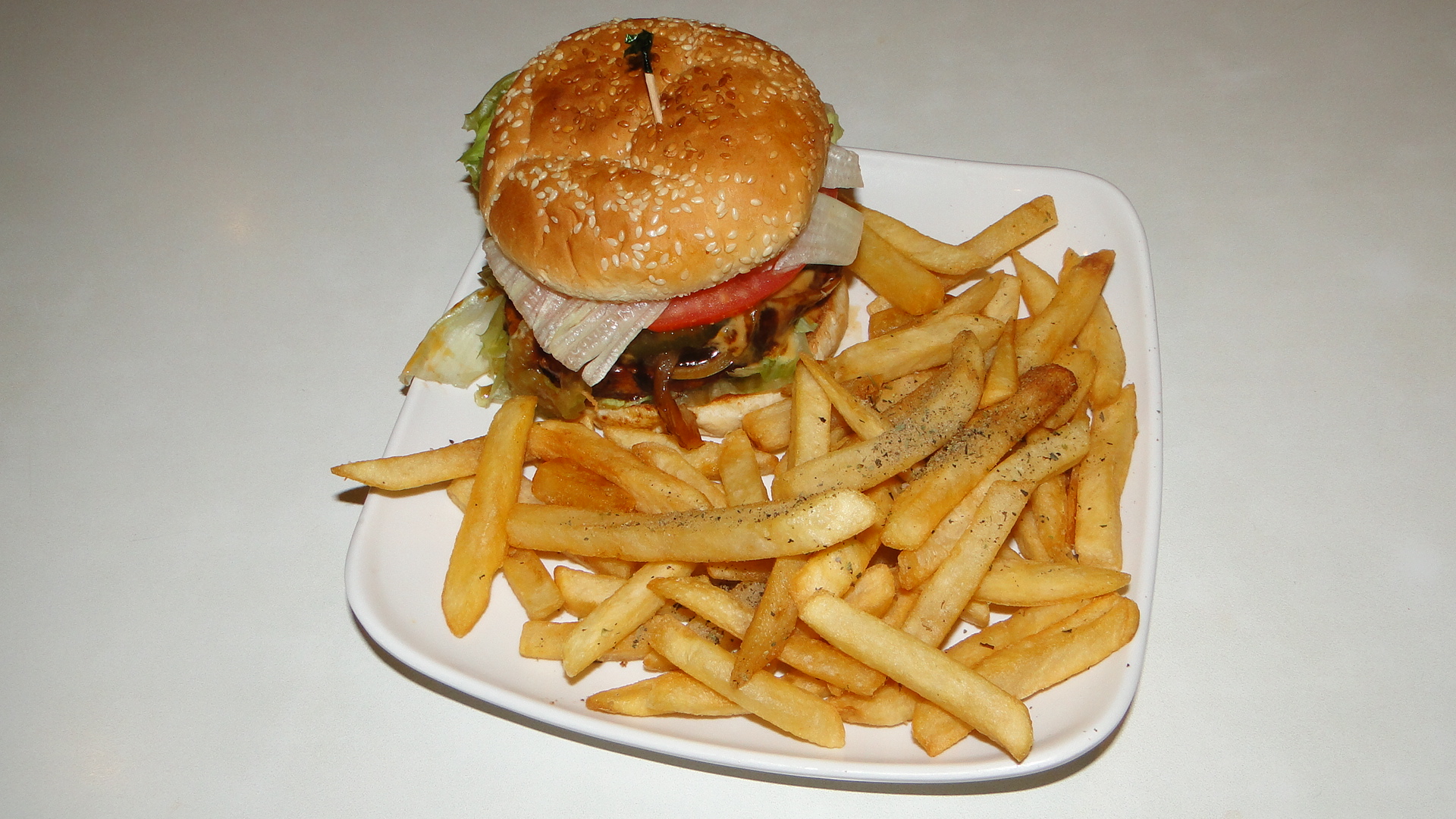Order 18. IMPOSSIBLE Burger food online from Loving Hut Vegan Express store, San Diego on bringmethat.com