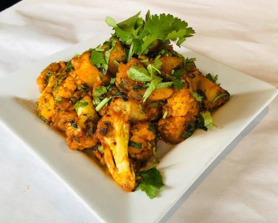 Order Aloo Gobi food online from Raj Express Indian Kitchen store, Overland Park on bringmethat.com