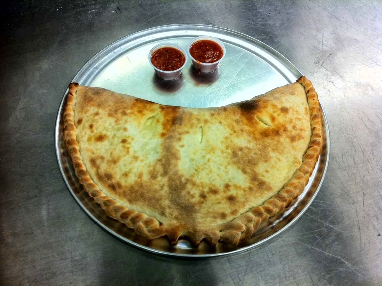 Order Sausage Calzone - Calzone food online from Slice Parlor store, Albuquerque on bringmethat.com