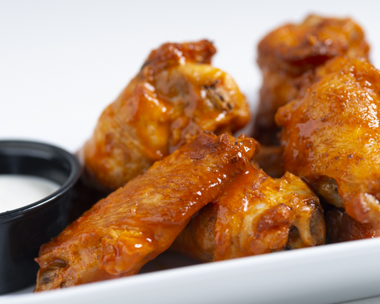 Order Buffalo Wings 12 Pieces food online from Pizzava store, Carson City on bringmethat.com