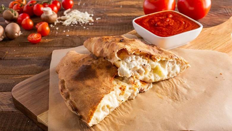 Order Roasted Garlic Chicken Calzone food online from Ameci Pizza & Pasta store, Los Alamitos on bringmethat.com