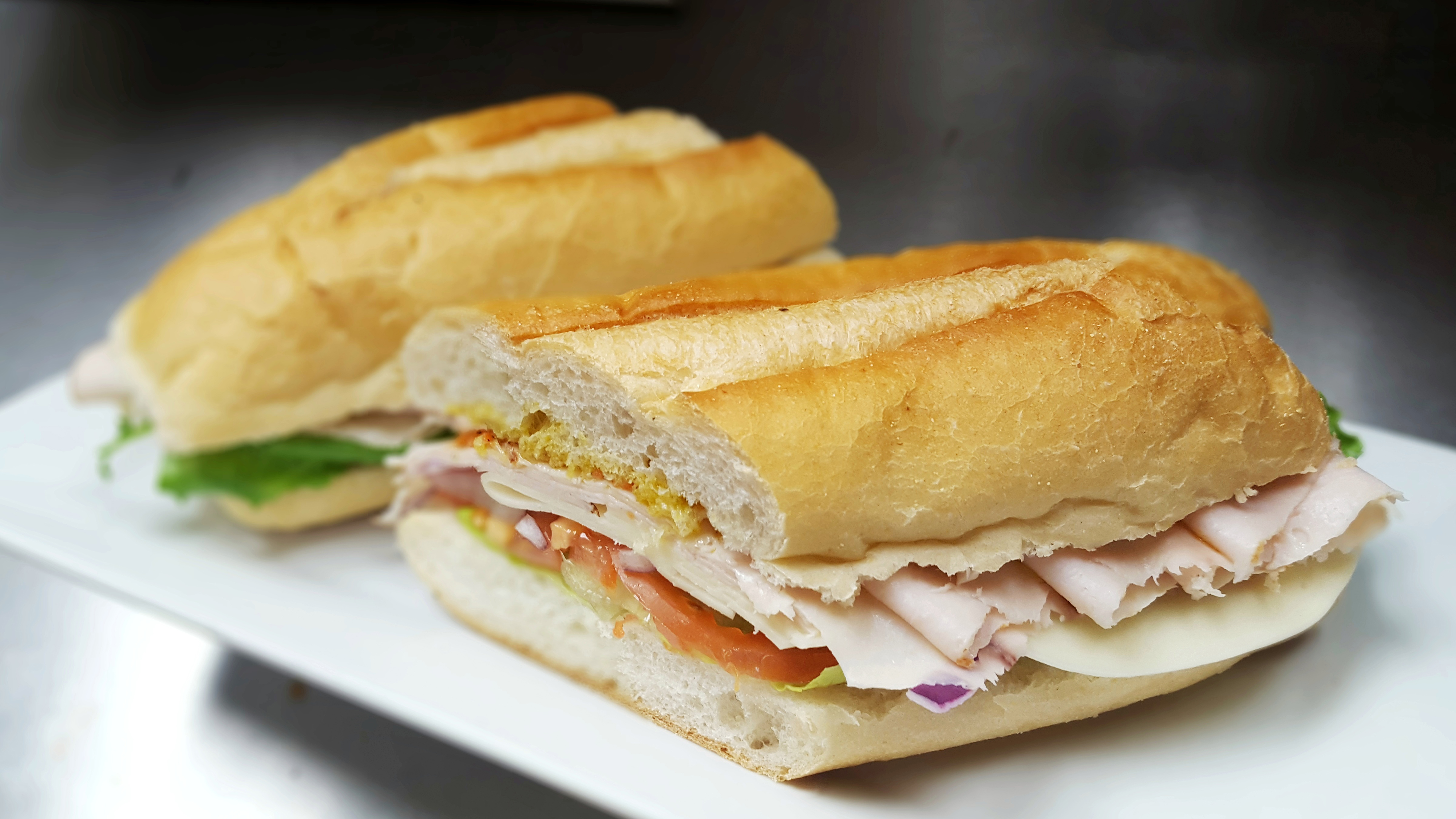 Order Turkey & Provolone Sub food online from Marios Pizza Center & Restaurant store, Middlesex on bringmethat.com