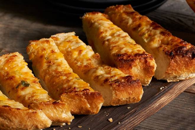 Order Three Cheese Garlic Bread food online from Black Angus Steakhouse store, Brentwood on bringmethat.com