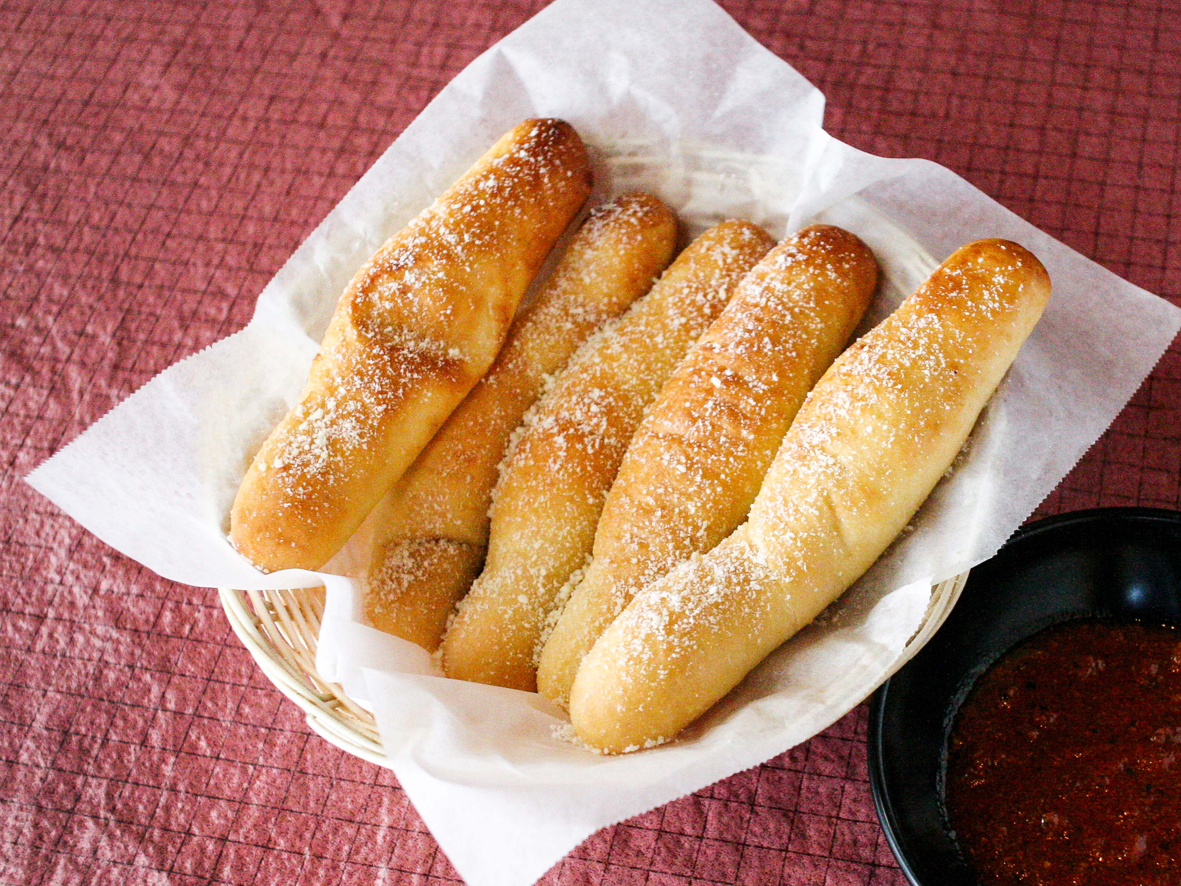 Order Garlic Baked Breadsticks with Meat Sauce food online from Alesi Pizza House store, Lafayette on bringmethat.com