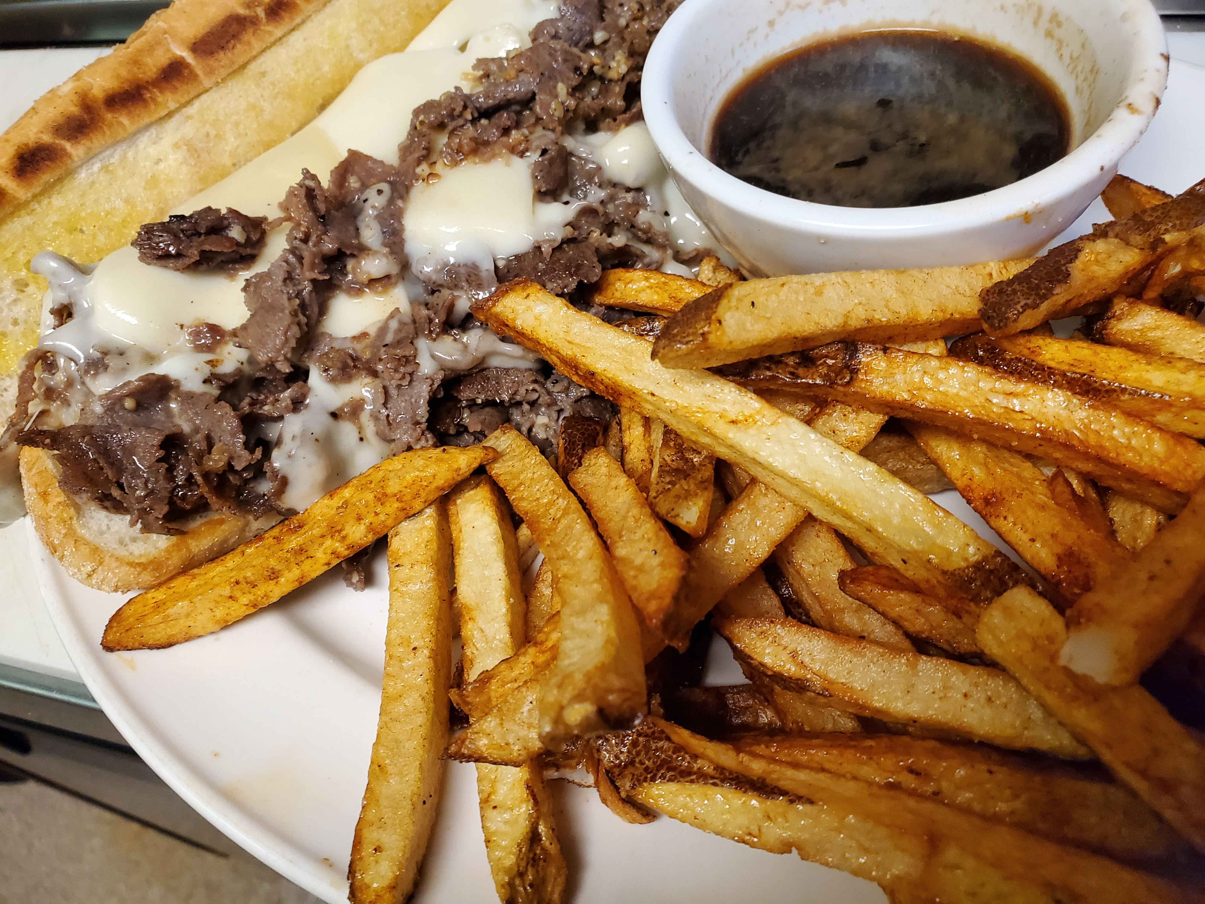 Order French Dip food online from Roadhouse Saloon store, Idaho Falls on bringmethat.com