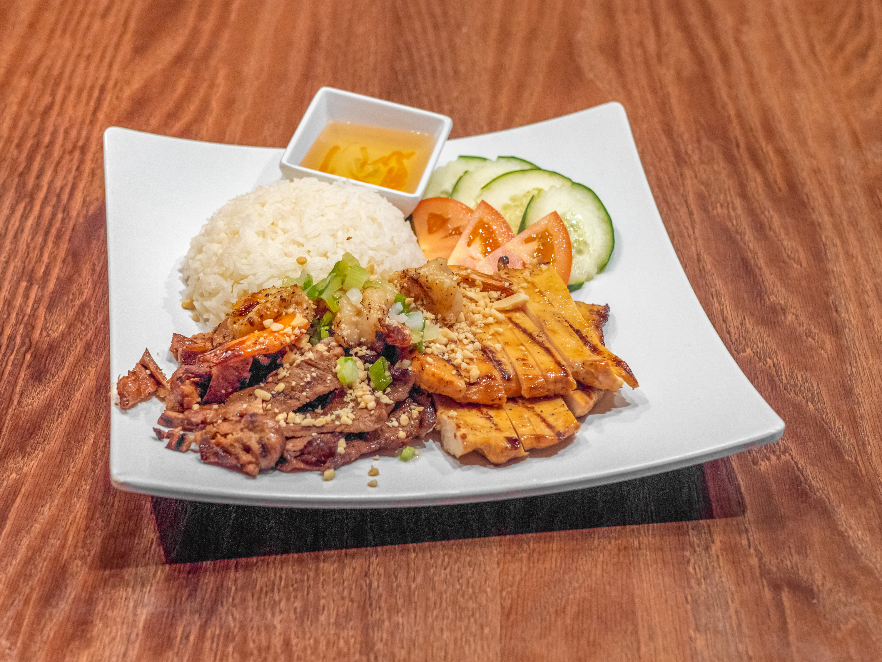 Order Meat Trio on Rice  food online from Miss Saigon Cafe store, Hurst on bringmethat.com