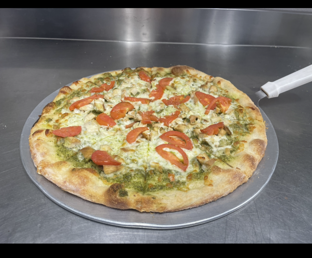 Order Pesto Chicken Pizza food online from Johnny's Pizza store, Cary on bringmethat.com