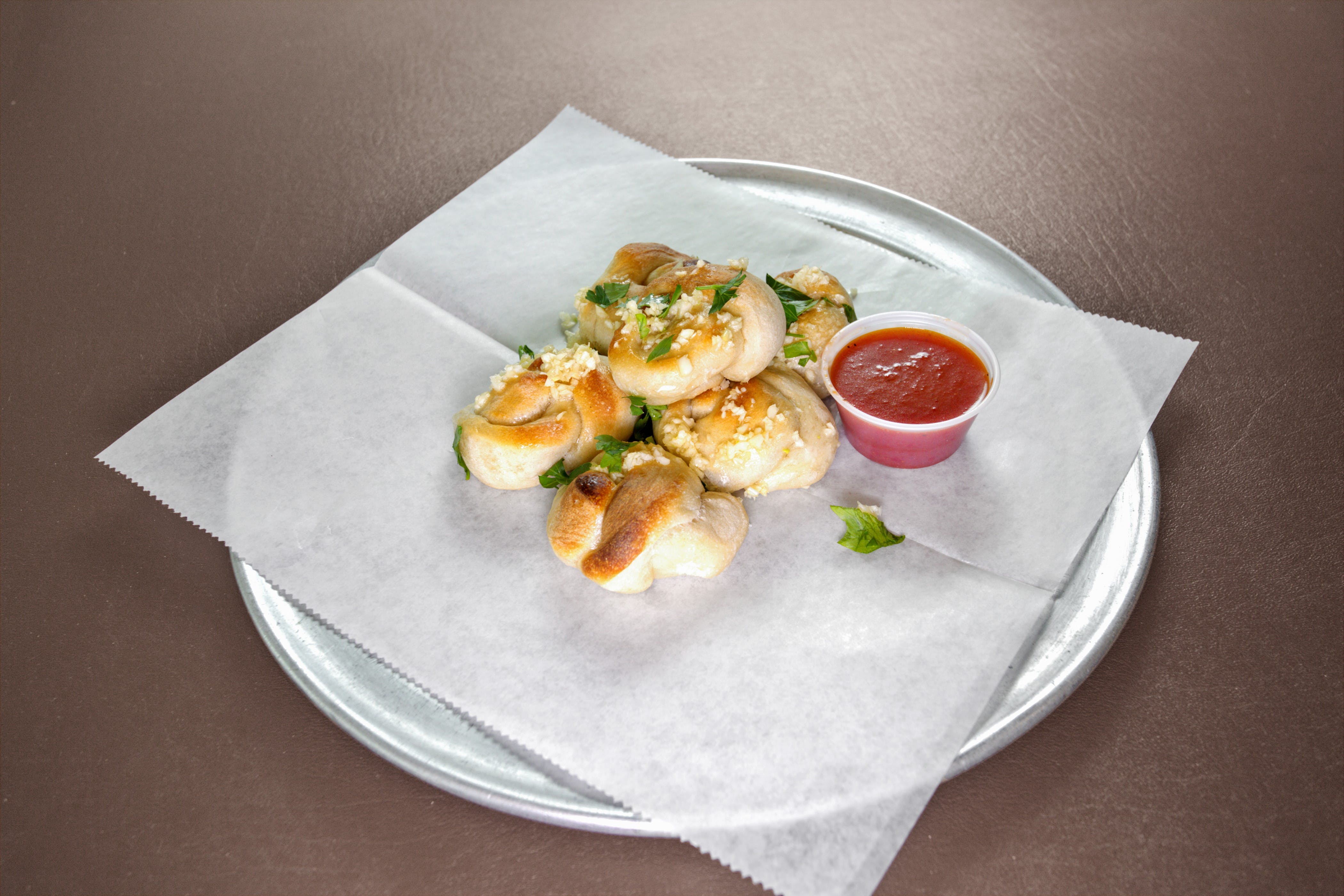 Order Garlic Knots - 6 Pieces food online from King Pizza store, Fogelsville on bringmethat.com
