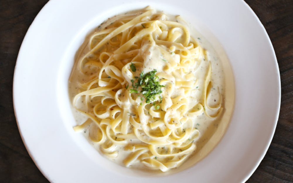 Order Fettuccini Alfredo - Pasta food online from Russo New York Pizzeria store, Houston on bringmethat.com