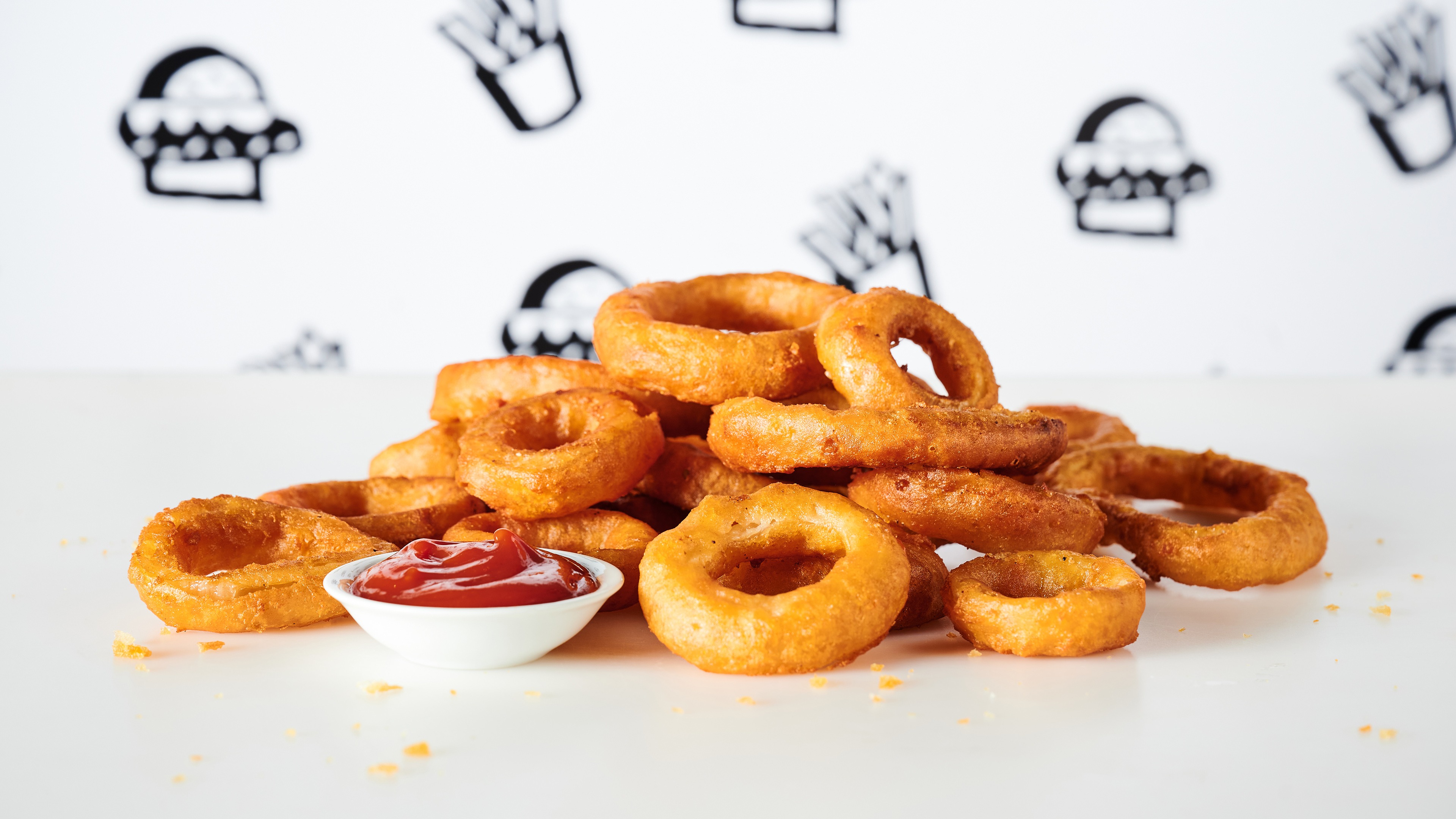 Order Onion Rings food online from Outlaw Burger store, Ontario on bringmethat.com