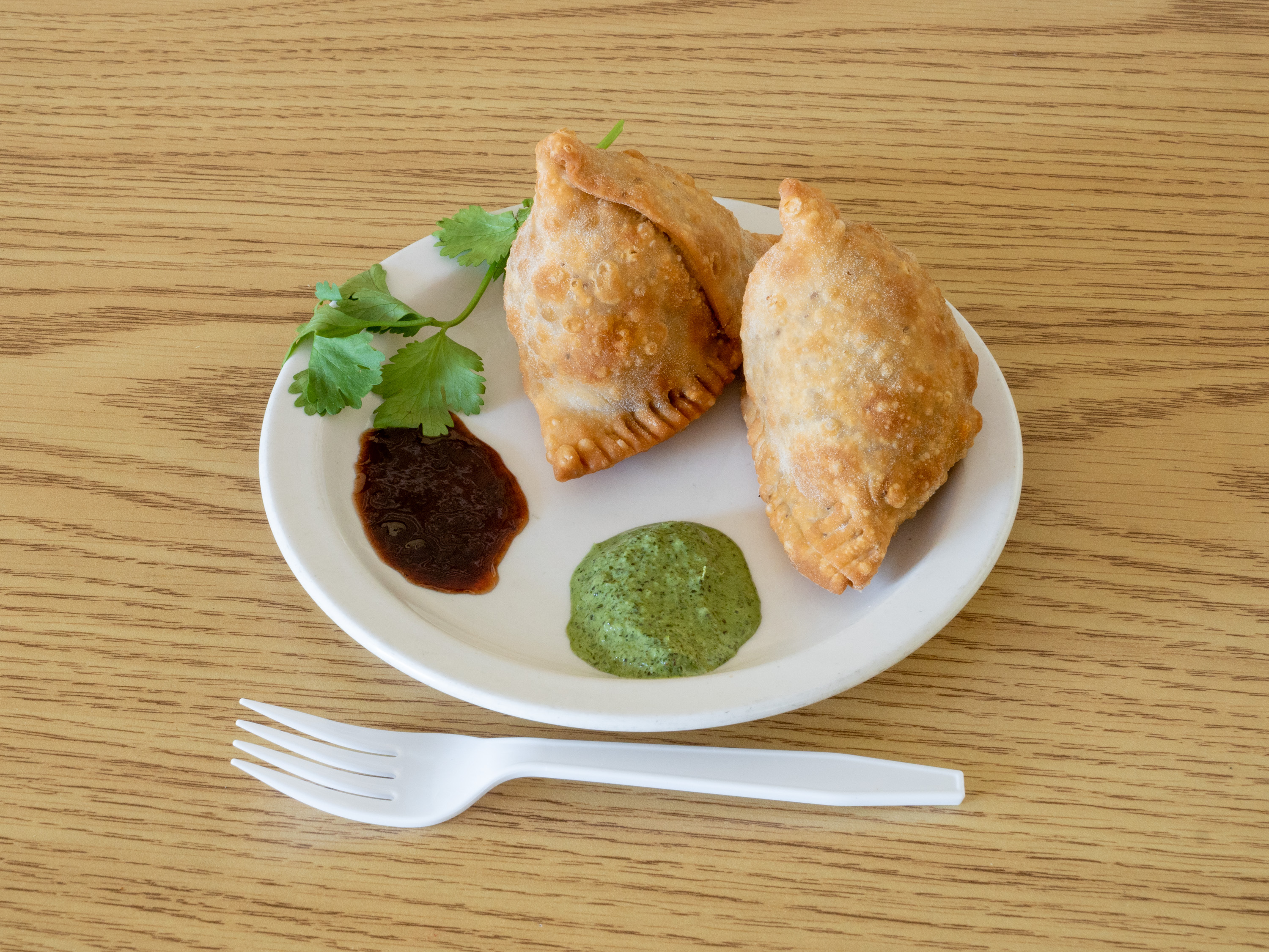 Order 2 Piece Vegetable Samosa food online from Kabobs Indian Grill store, Minneapolis on bringmethat.com