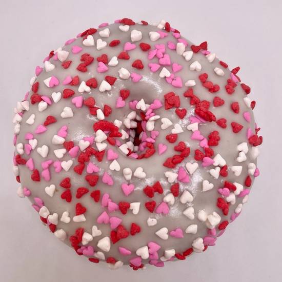 Order Vegan Vanilla Glazed with Heart-Shaped Sprinkles food online from Union Square Donuts store, Brookline on bringmethat.com