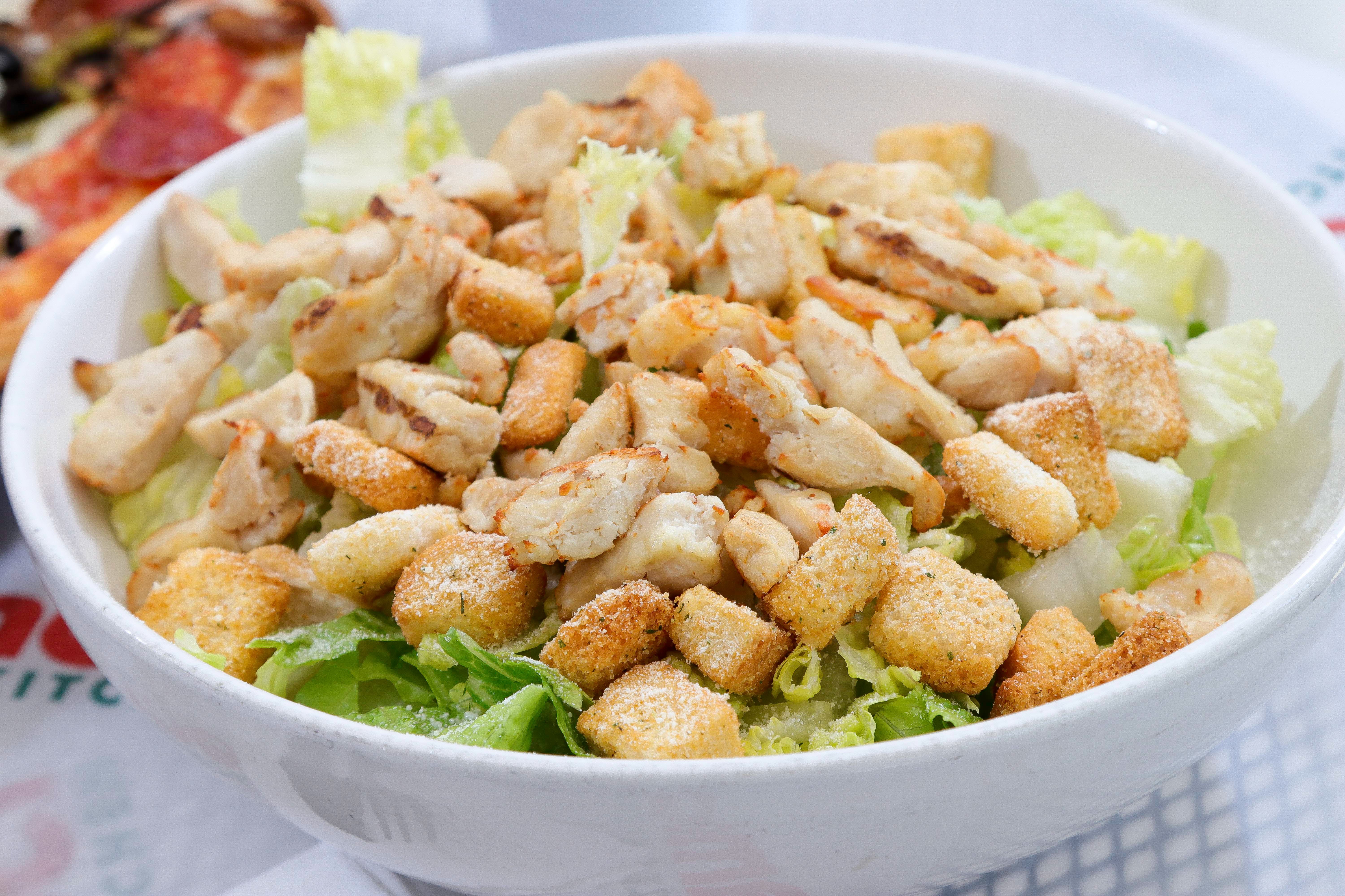 Order Grilled Chicken Caesar Salad - Salad food online from Ameci Pizza & Pasta store, Canyon Country on bringmethat.com
