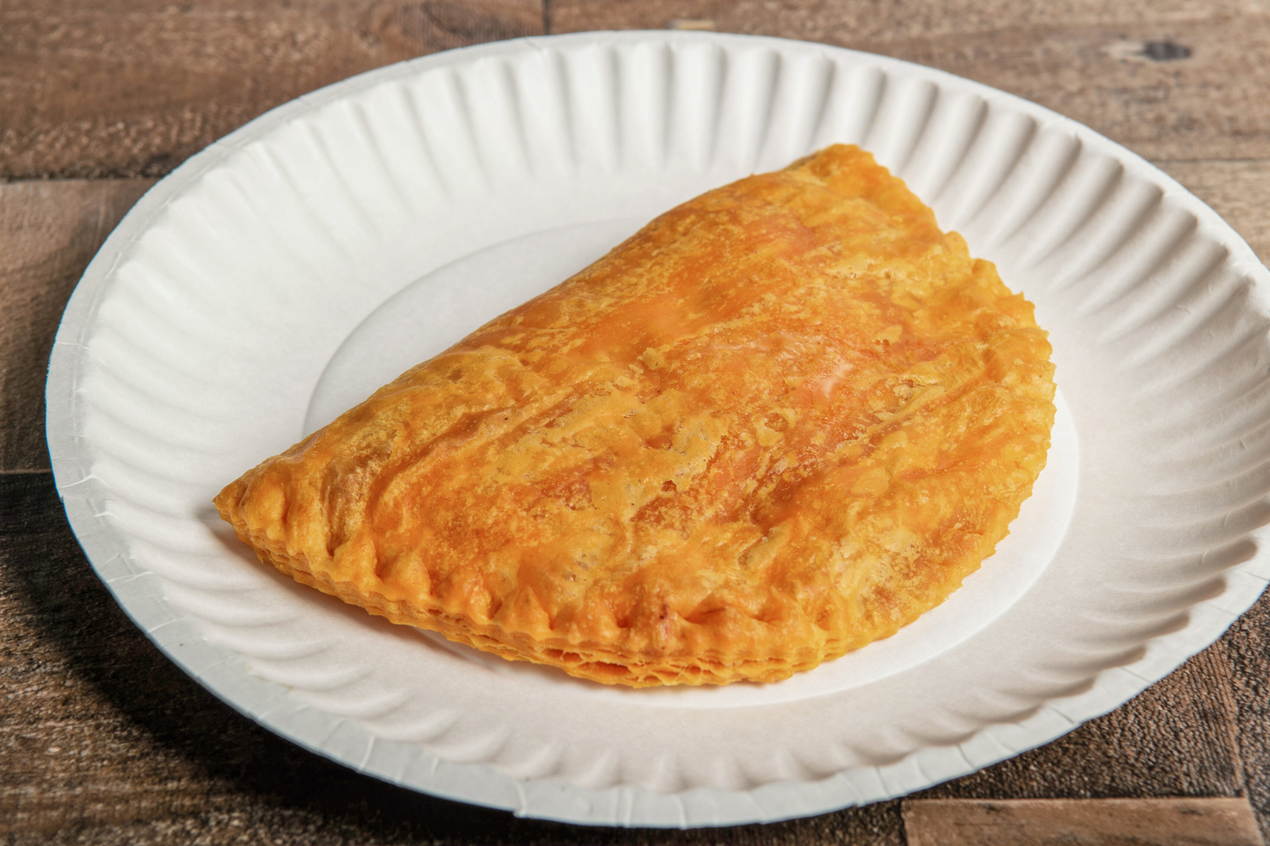 Order Jamaican Pattie - Side food online from Mojoes Chicken store, Rochester on bringmethat.com