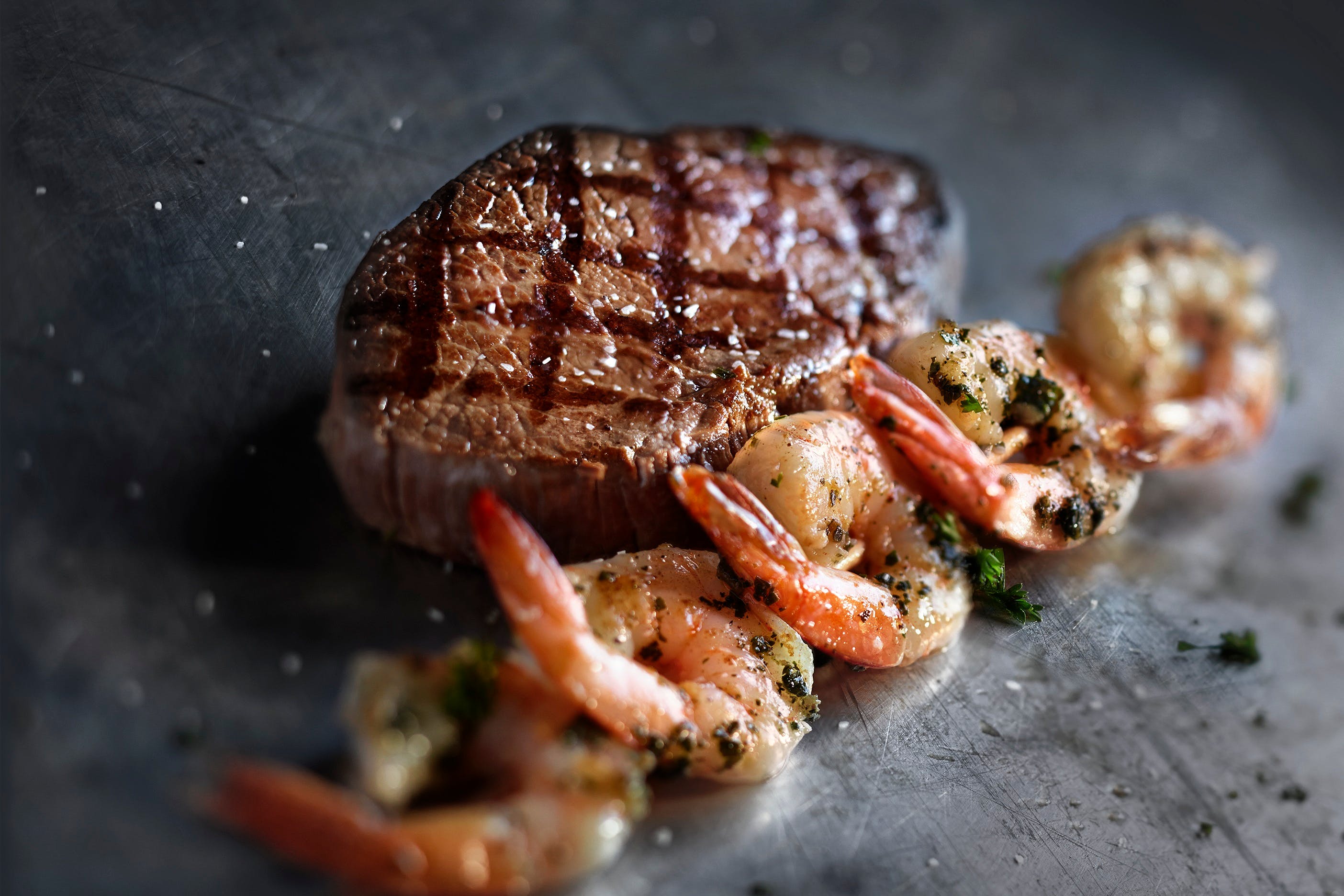 Order Grilled Shrimp & Sirloin - 10 oz. food online from Uno Pizzeria & Grill store, Birch Run on bringmethat.com