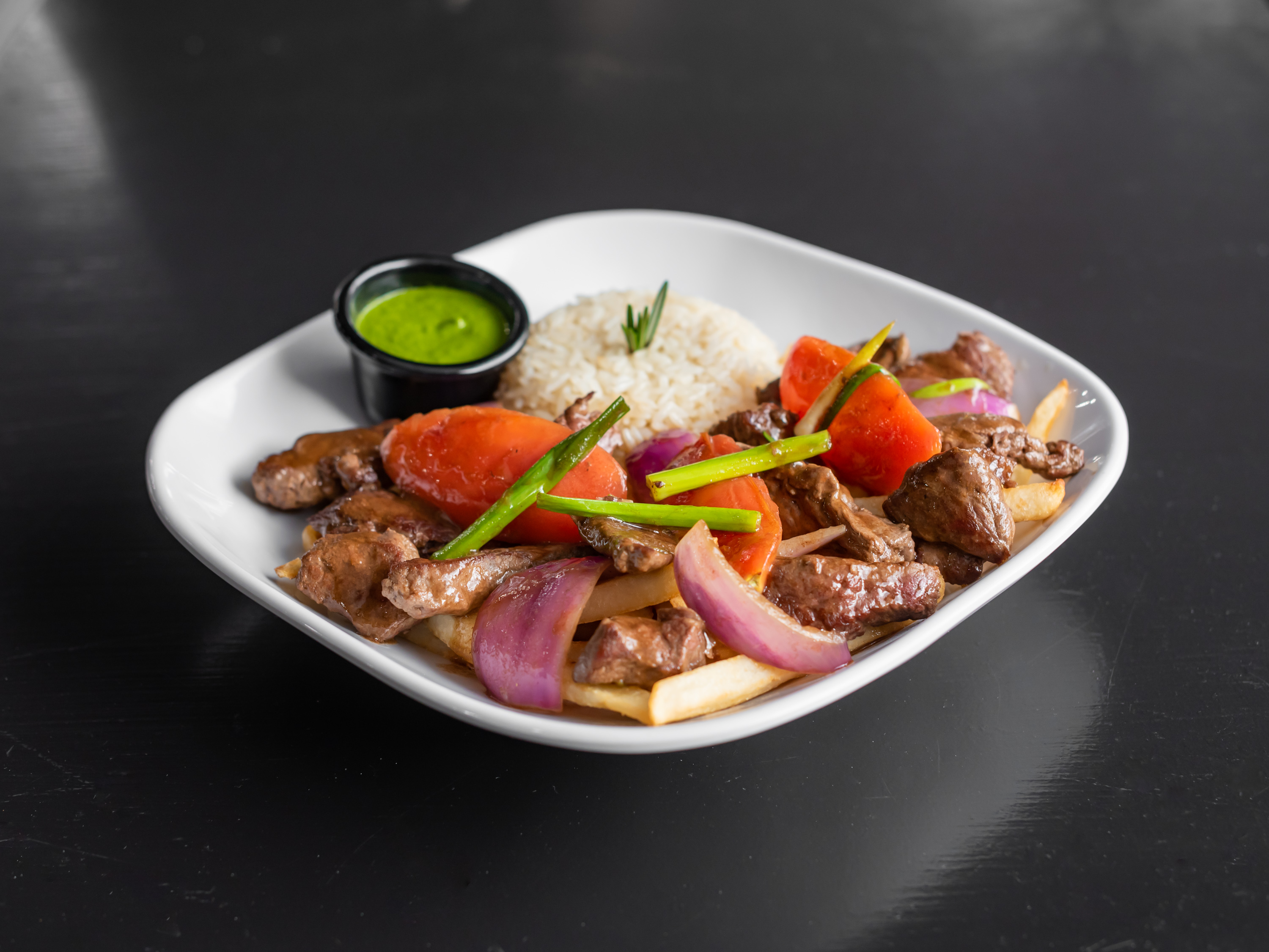 Order Lomo Saltado food online from Dads Kitchen store, Indianapolis on bringmethat.com