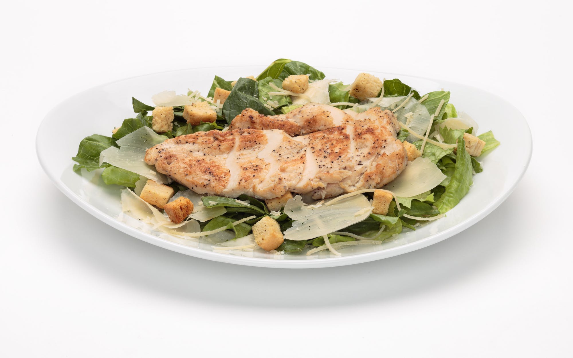 Order Chicken Caesar Salad - Half Size food online from Oggi Sports | Brewhouse | Pizza store, Mission Viejo on bringmethat.com