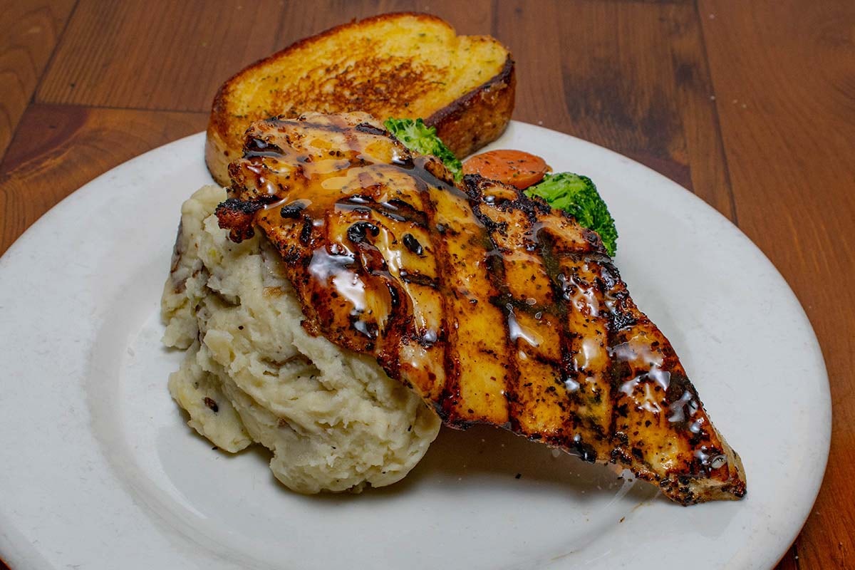 Order Grilled Chicken Breast food online from Boudreaux's Cajun Kitchen store, Houston on bringmethat.com