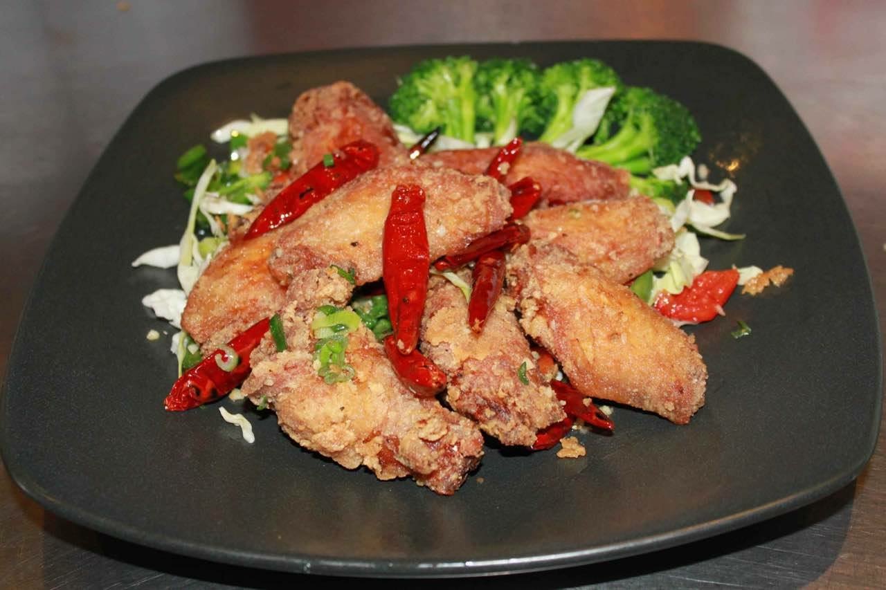 Order 6. Eight Piece Salt and Pepper Chicken Wings food online from Jade China store, Riverside on bringmethat.com