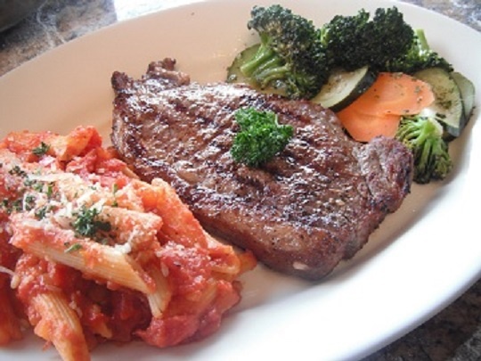 Order Rib Eye Steak food online from Zorbas Pizza store, Millbrae on bringmethat.com