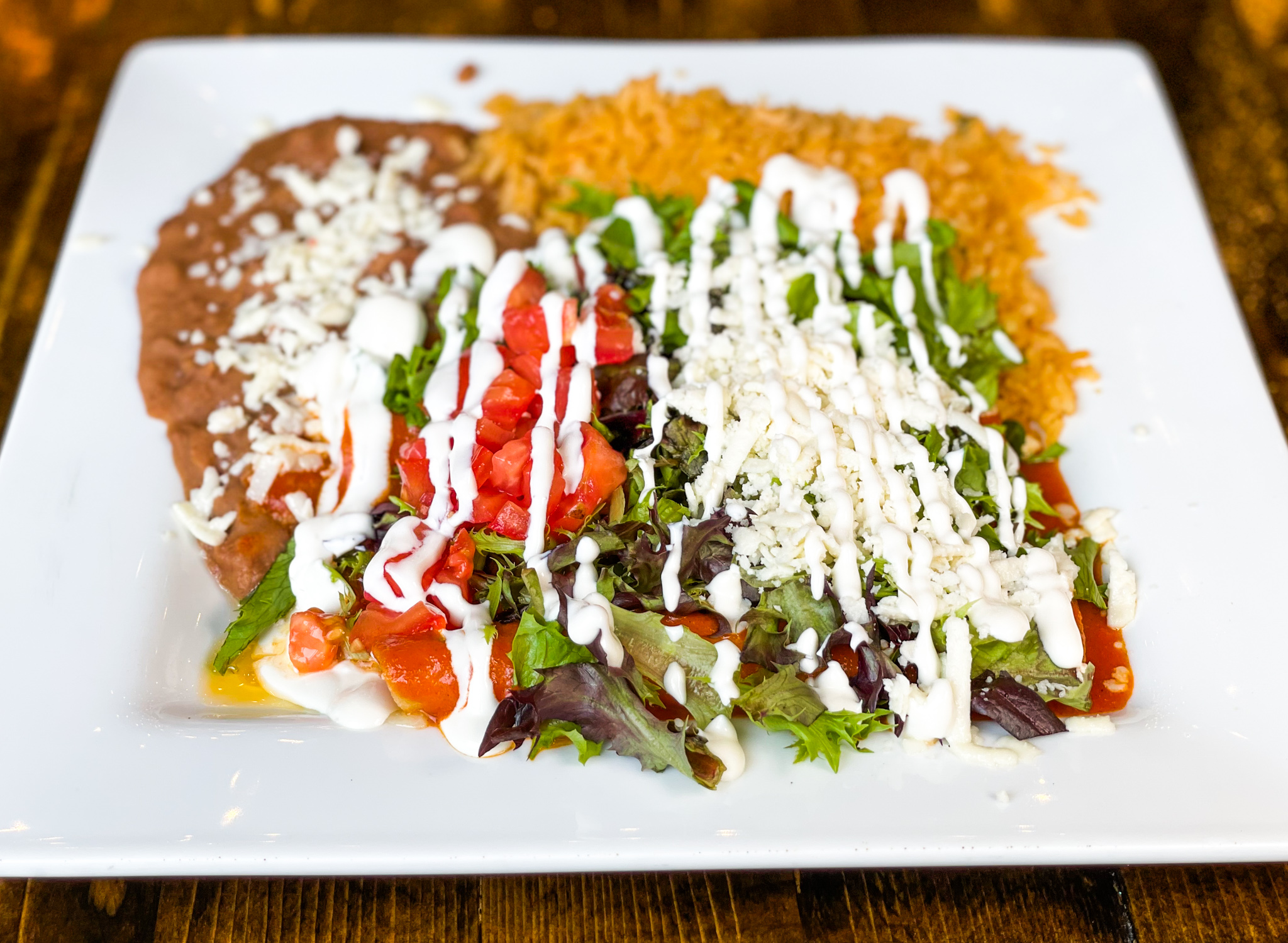 Order Enchiladas Supreme food online from Cantina Louie store, Asheville on bringmethat.com