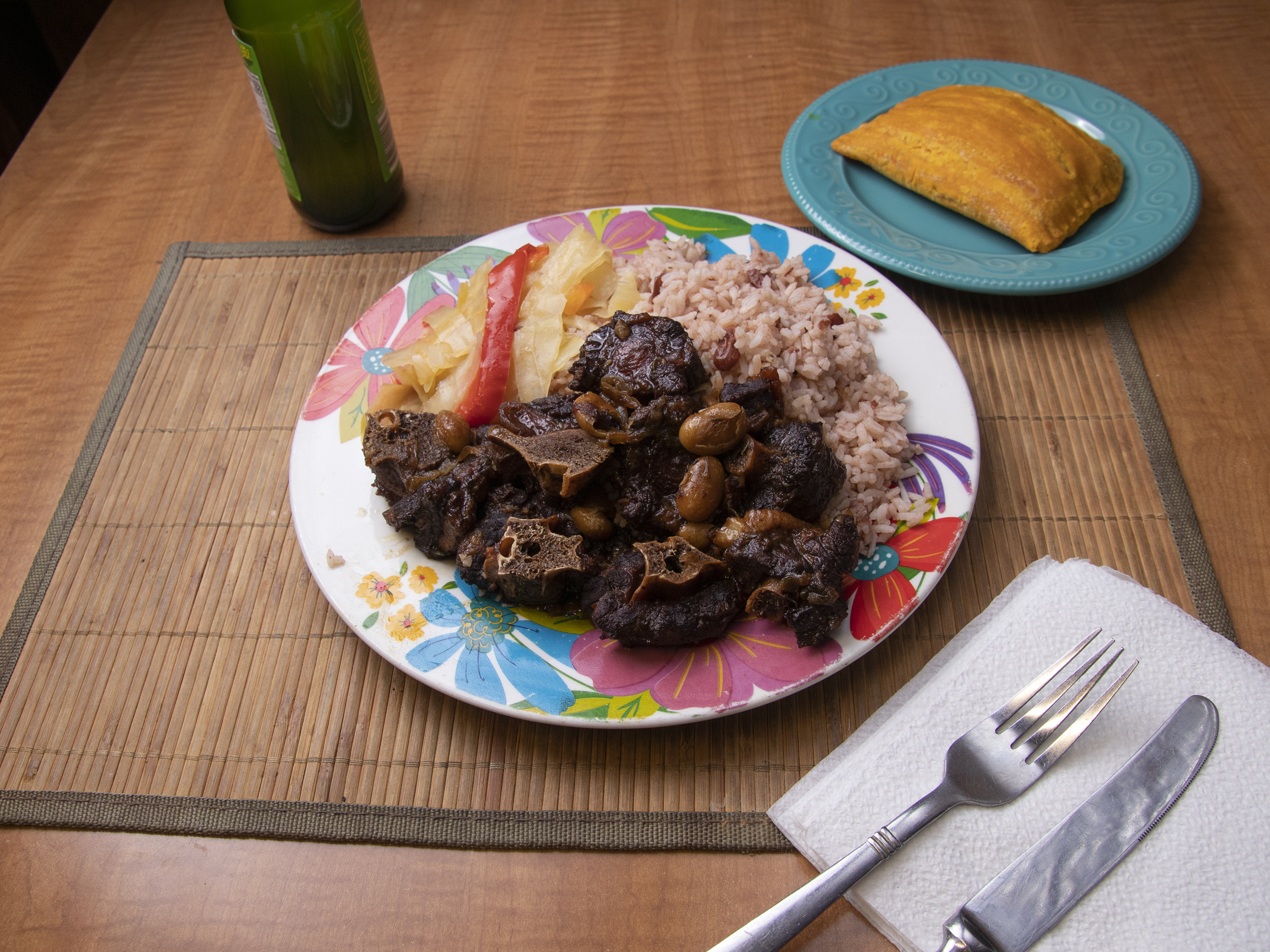 Order Oxtail food online from Spice Island Jamaican Restaurant store, Stone Mountain on bringmethat.com