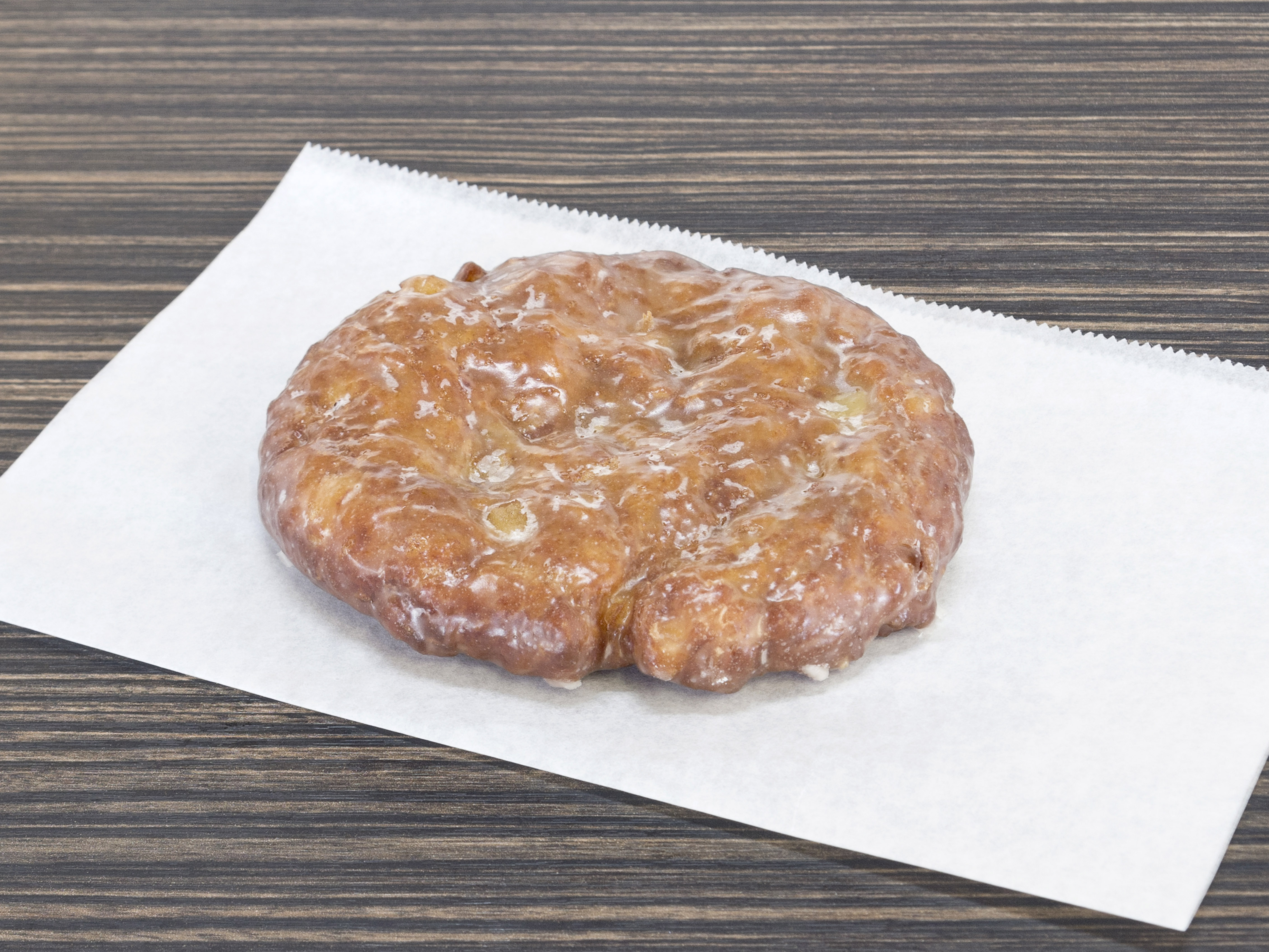 Order Apple Fritter Donut food online from Red Oak Donuts store, Red Oak on bringmethat.com