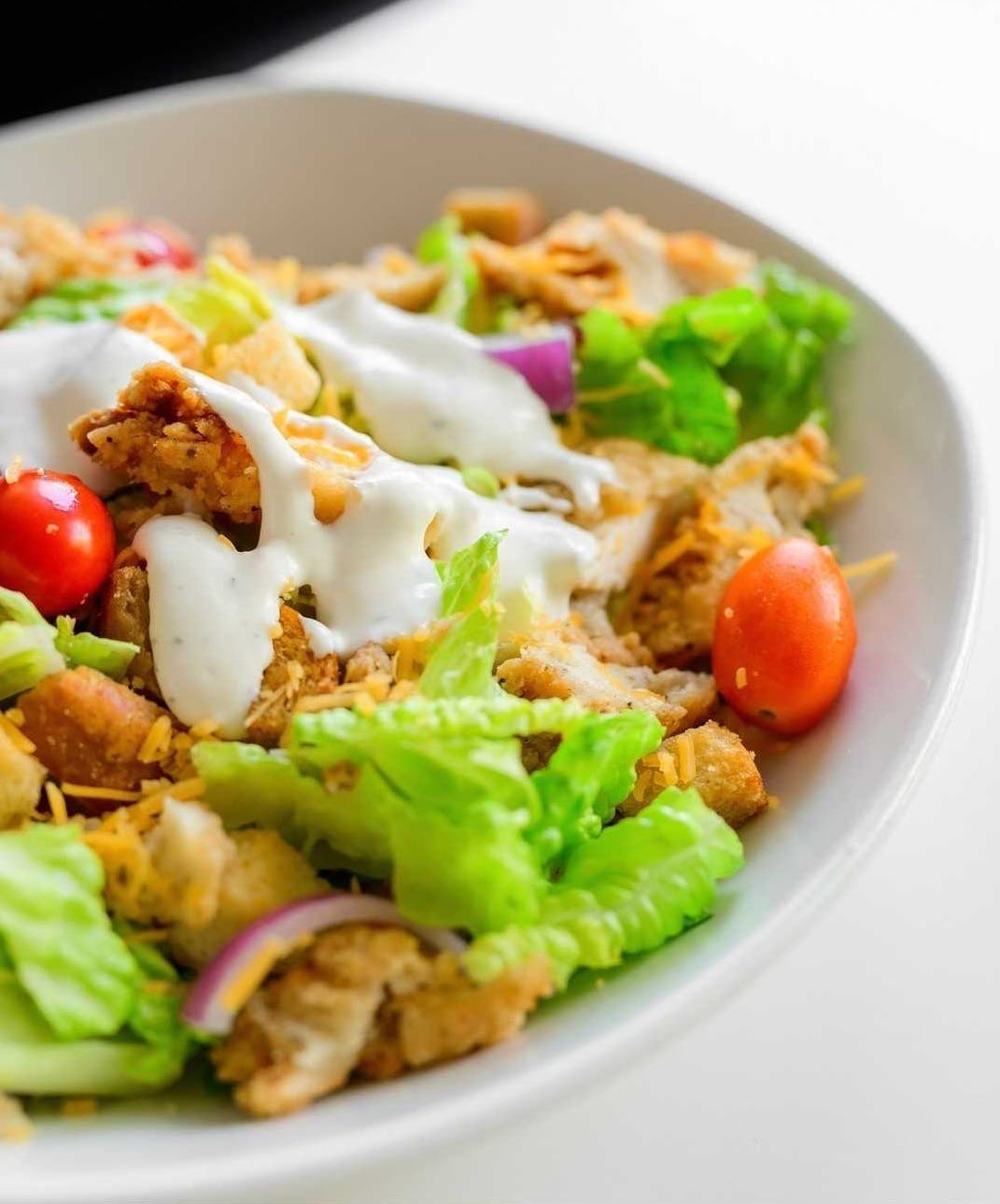 Order Crispy Chicken Salad - Salad food online from The Loop Pizza Grill store, Kernersville on bringmethat.com