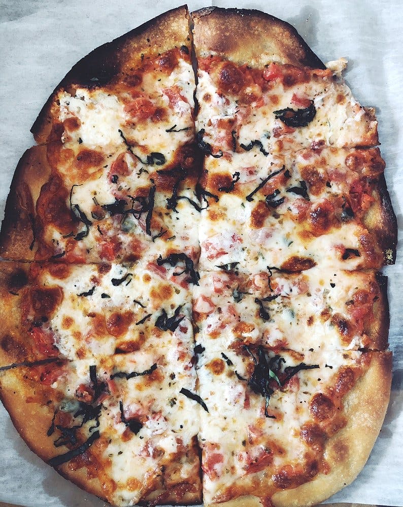 Order Margherita Pizza - Personal food online from The Brick Oven Bistro store, Sandusky on bringmethat.com