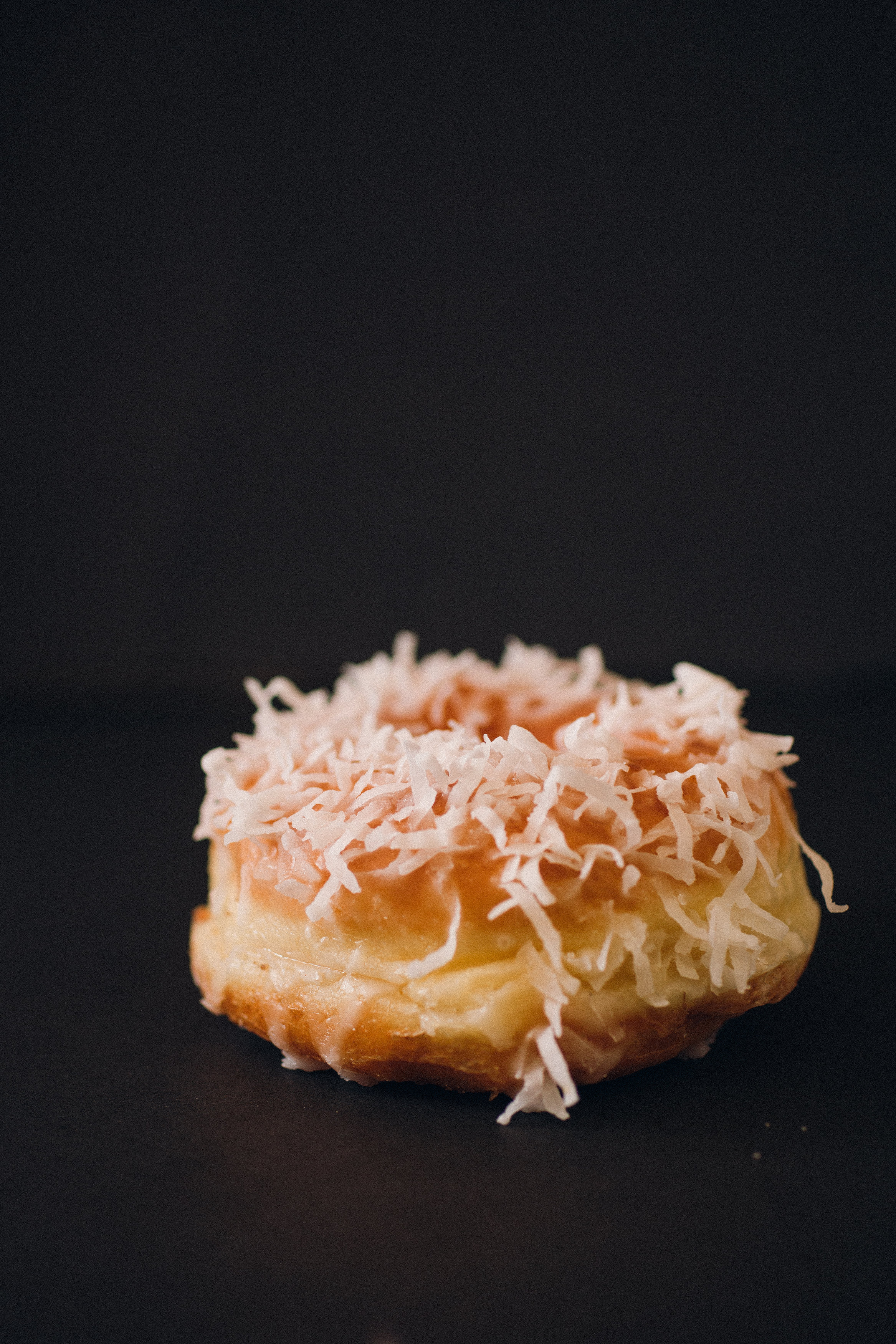 Order Coconut Glaze food online from Smile Donuts store, Hurst on bringmethat.com