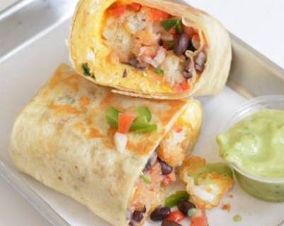Order Huevos Rancheros Burrito food online from Mr. Cheesesteak store, Durham on bringmethat.com