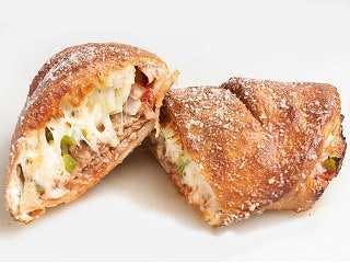 Order Vegan Sausage Calzone - Regular food online from Sarpino's Pizzeria  store, Northbrook on bringmethat.com