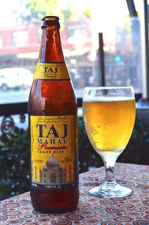 Order Taj Premium Indian Lager Beer (750ml Bottle) food online from Mainland India Restaurant store, Niles on bringmethat.com