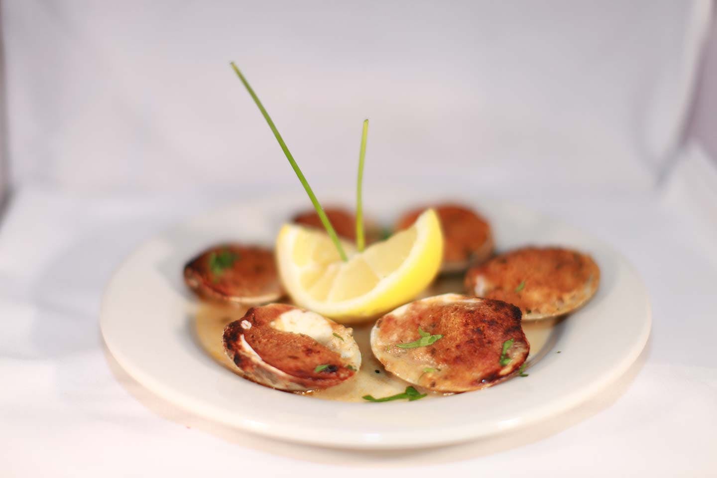Order Baked Clams - 6 Pieces food online from Delizia 92 restaurant & pizza store, New York on bringmethat.com