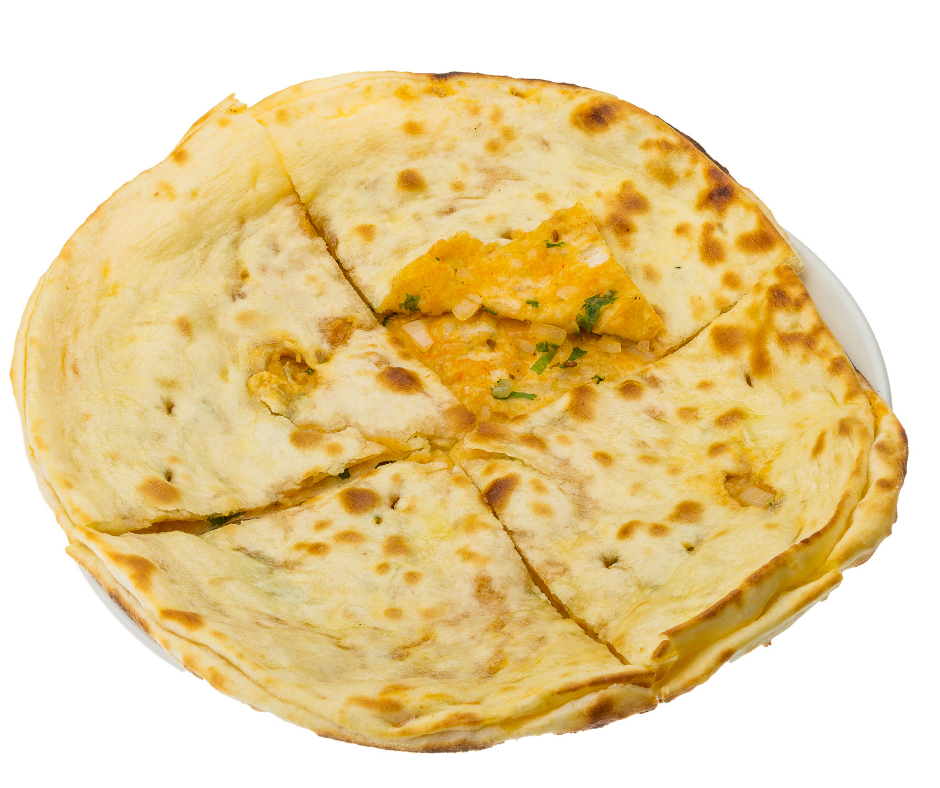 Order Naan food online from Spices Of India Kitchen store, Irving on bringmethat.com