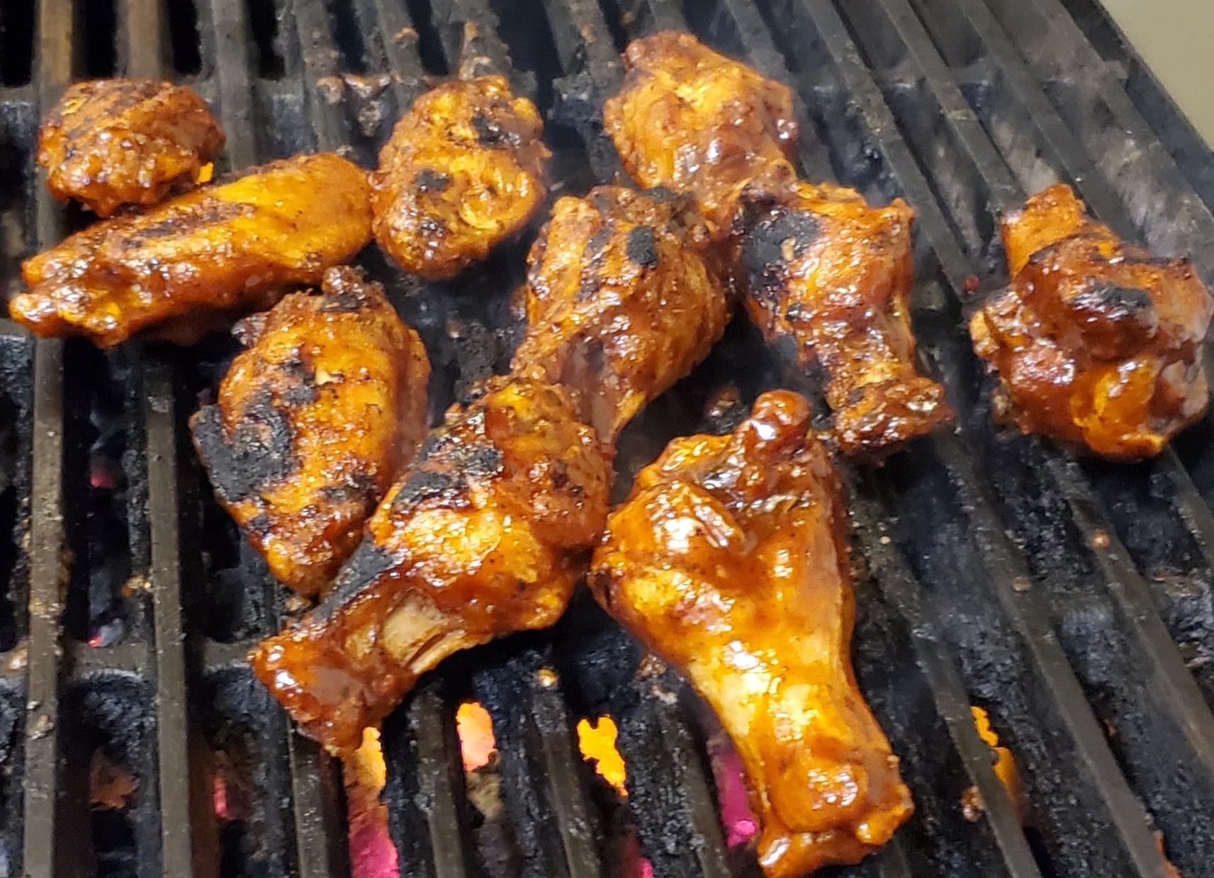 Order Grilled Jerk Wings (10) food online from Knuckles Knockout Grill store, Rochester on bringmethat.com