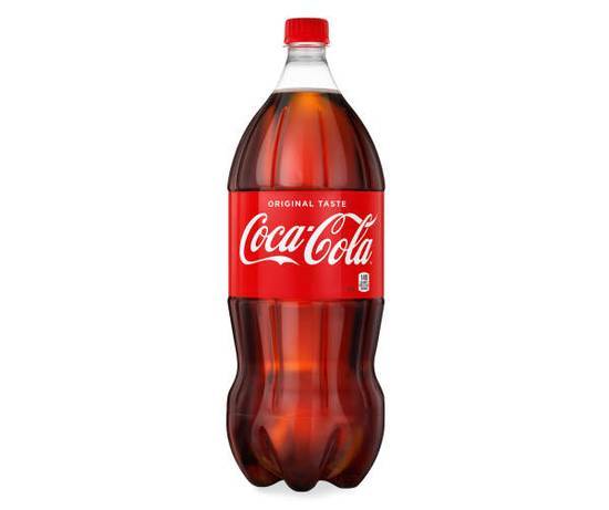 Order 2 liter coke food online from Redi-Spaghetti.Com store, Tempe on bringmethat.com