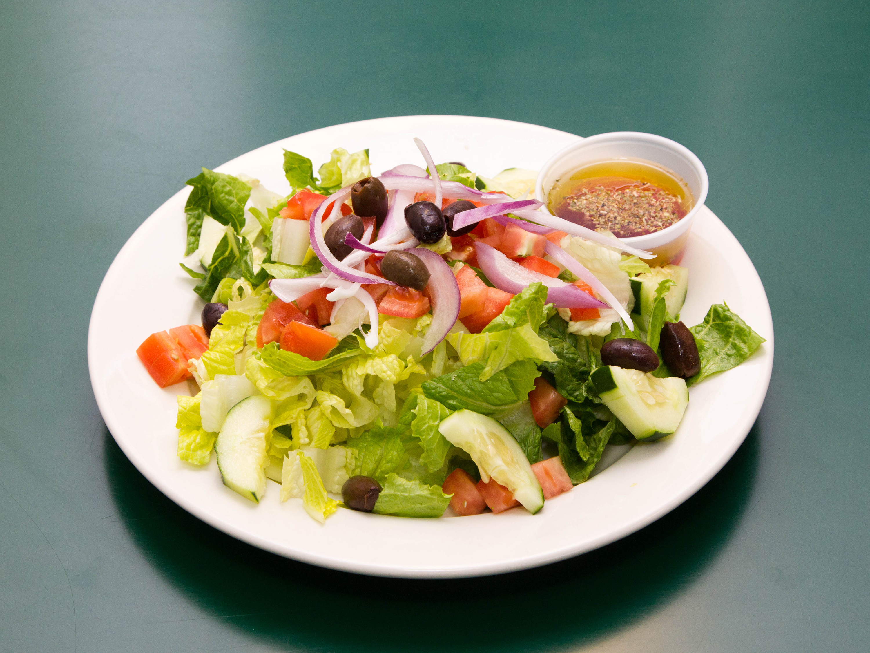 Order Garden Salad food online from Johns Pizza & Grill store, Long Branch on bringmethat.com