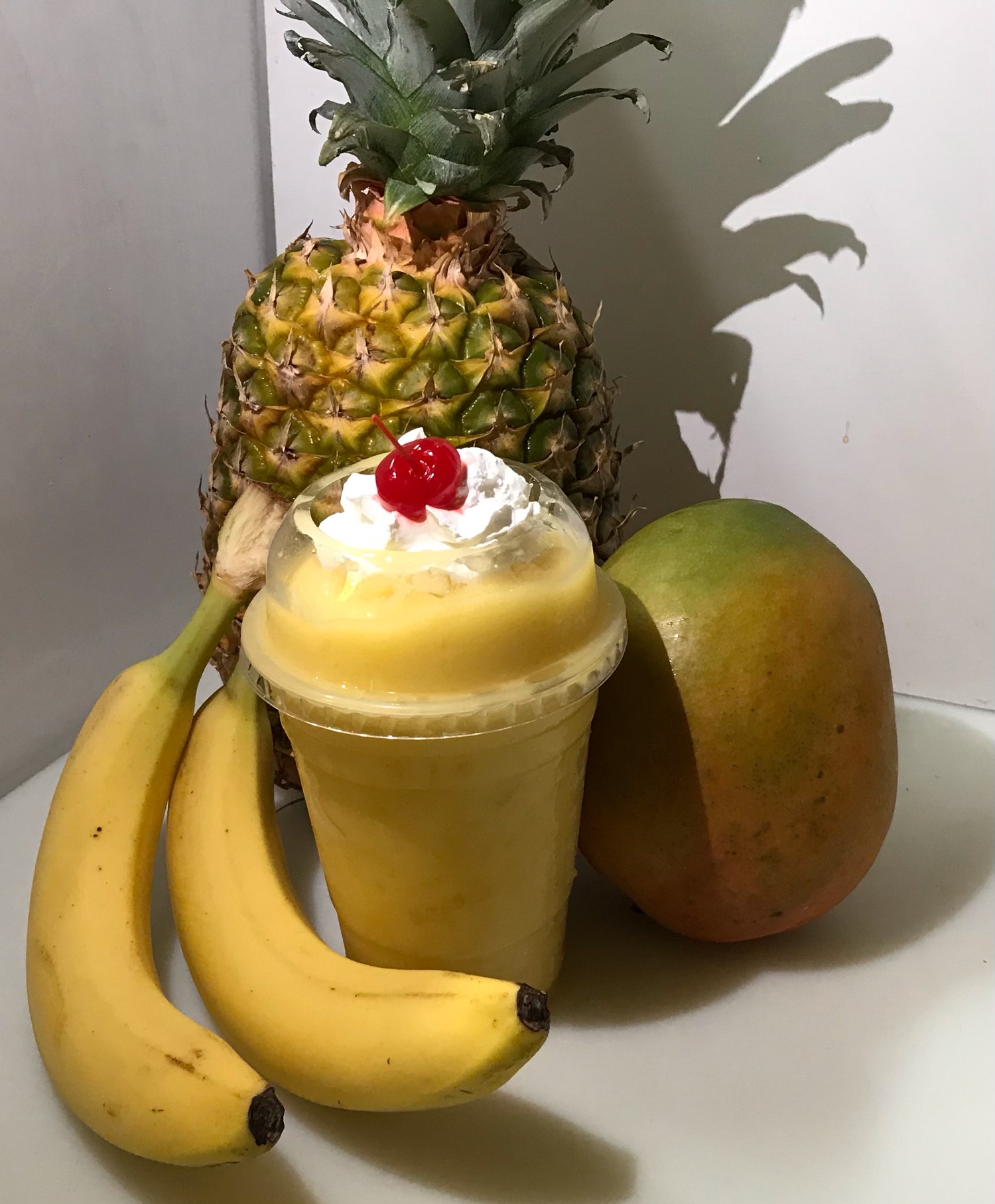 Order #1 Banana, Pineapple, Mango smoothie  food online from El Papayon store, Ontario on bringmethat.com