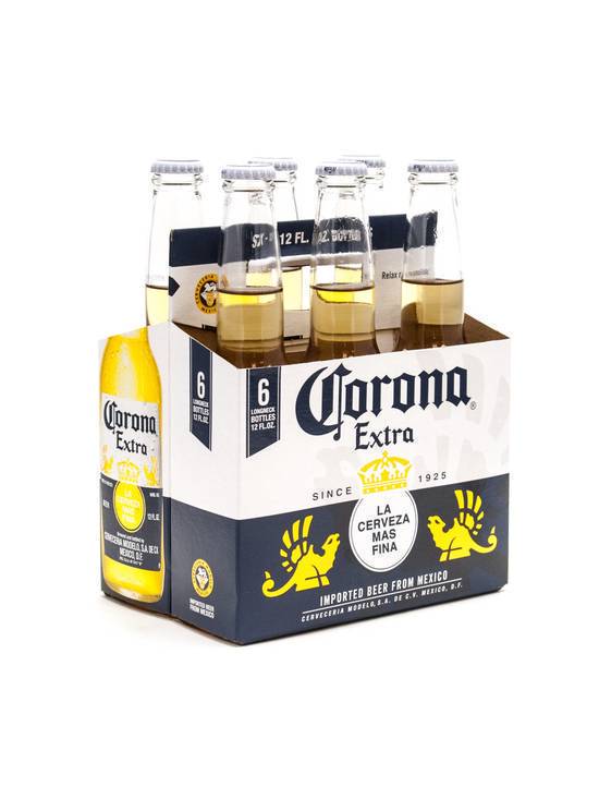 Order Corona Extra 6 Pack, 12 OZ each (4.6 % ABV) food online from Chevron Extramile store, Tustin on bringmethat.com
