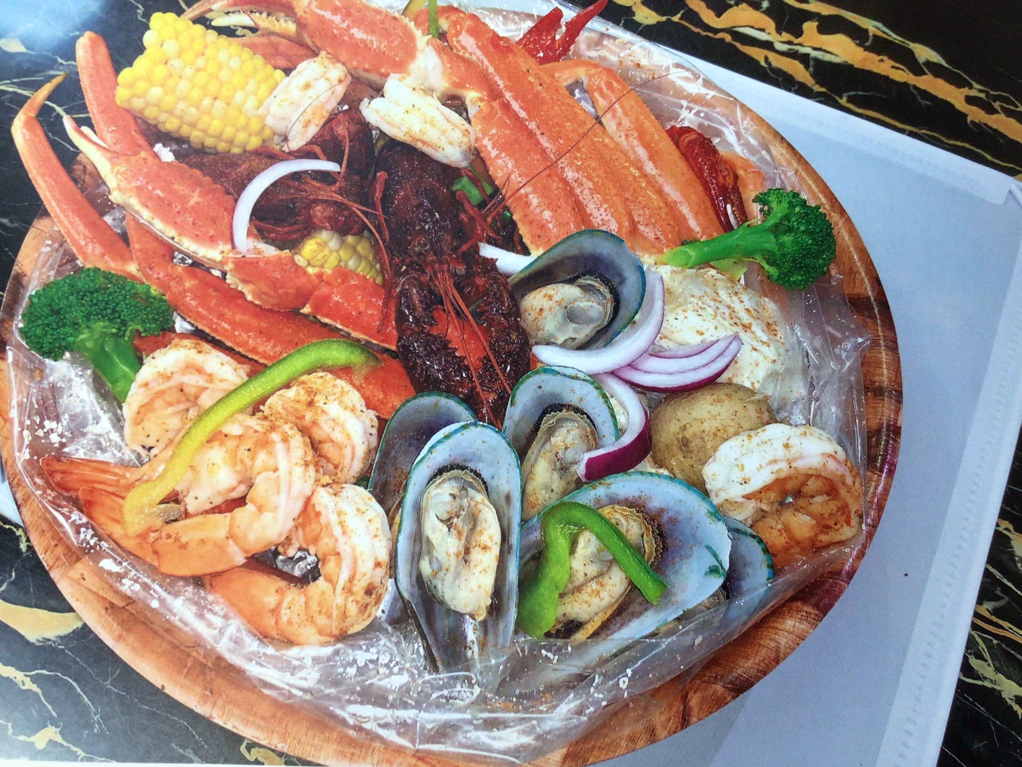 Order seafood boil bag combo#53 food online from Jamaica fish market store, Richmond Hill on bringmethat.com