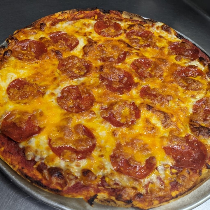 Order Pepperoni Pizza food online from Kick Butt Café store, Austin on bringmethat.com