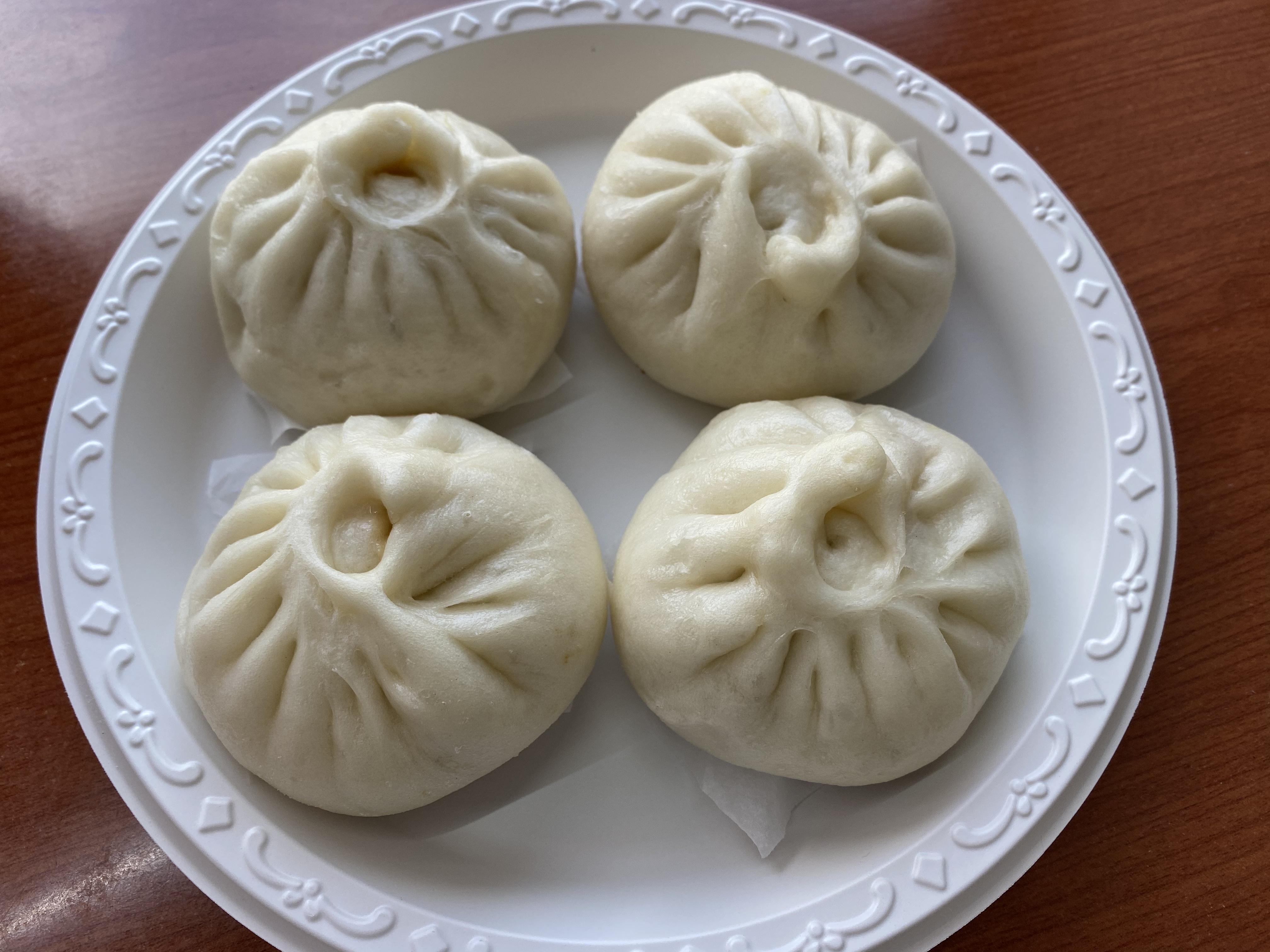 Order 34d. Steamed Pork Buns food online from Tong Kwong Kitchen store, Hempstead on bringmethat.com