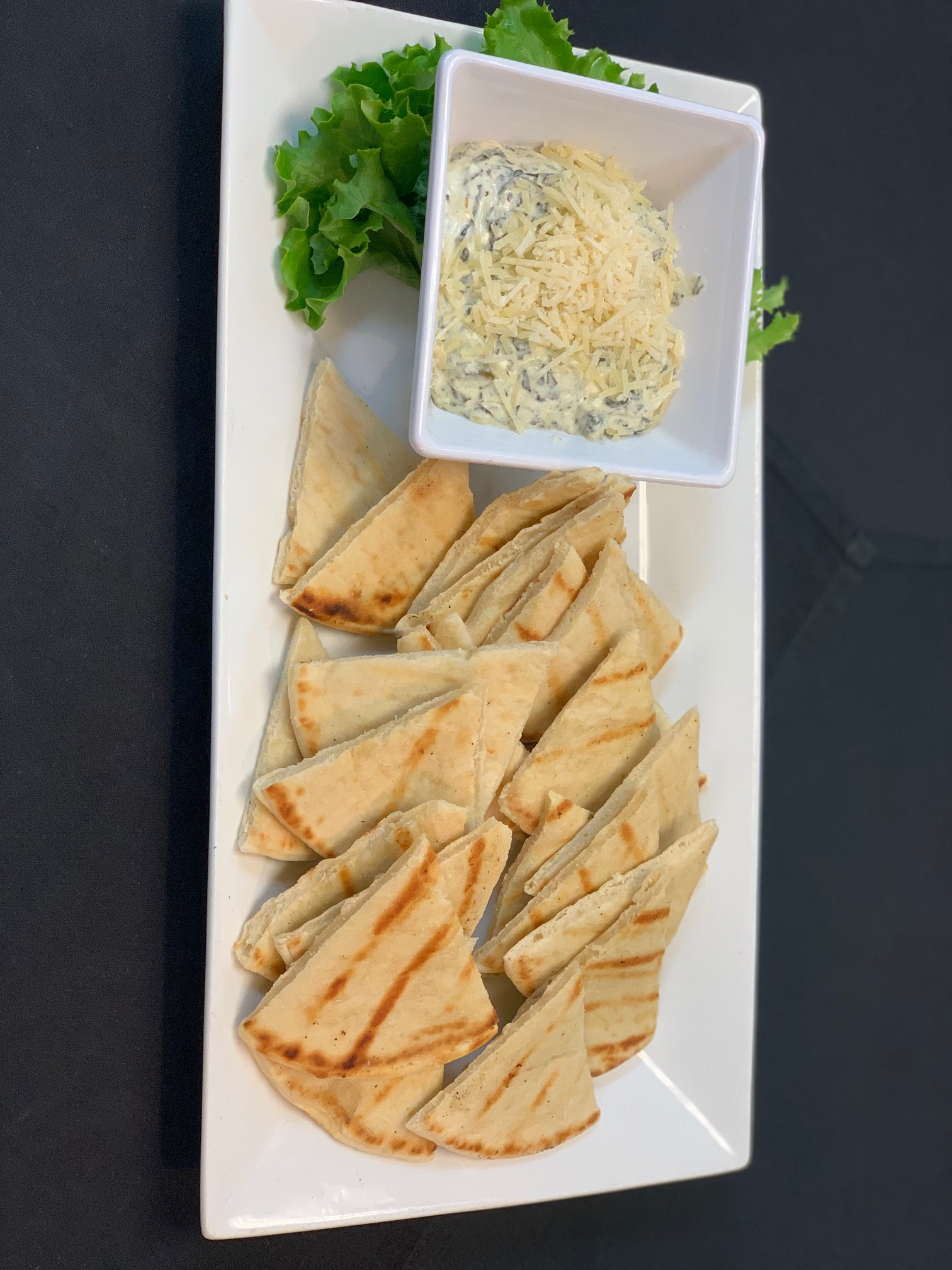 Order Spinach Dip food online from 2 Penguins Tap And Grill store, Centennial on bringmethat.com