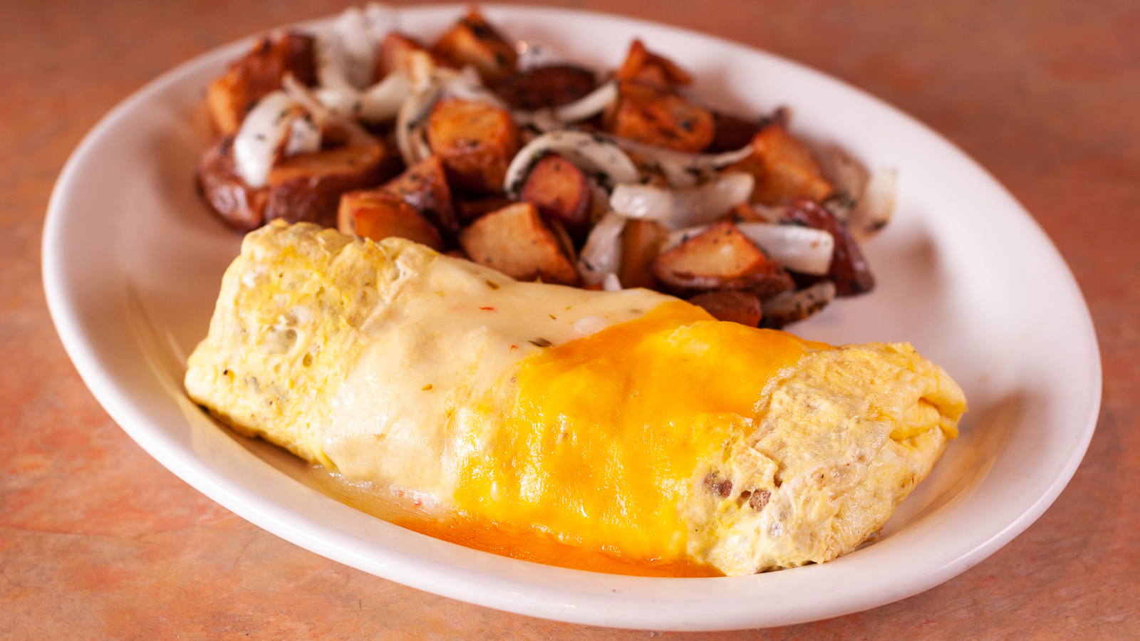Order Spicy Sausage and Cheese Omelette food online from The Coffee Mill store, Oakland on bringmethat.com