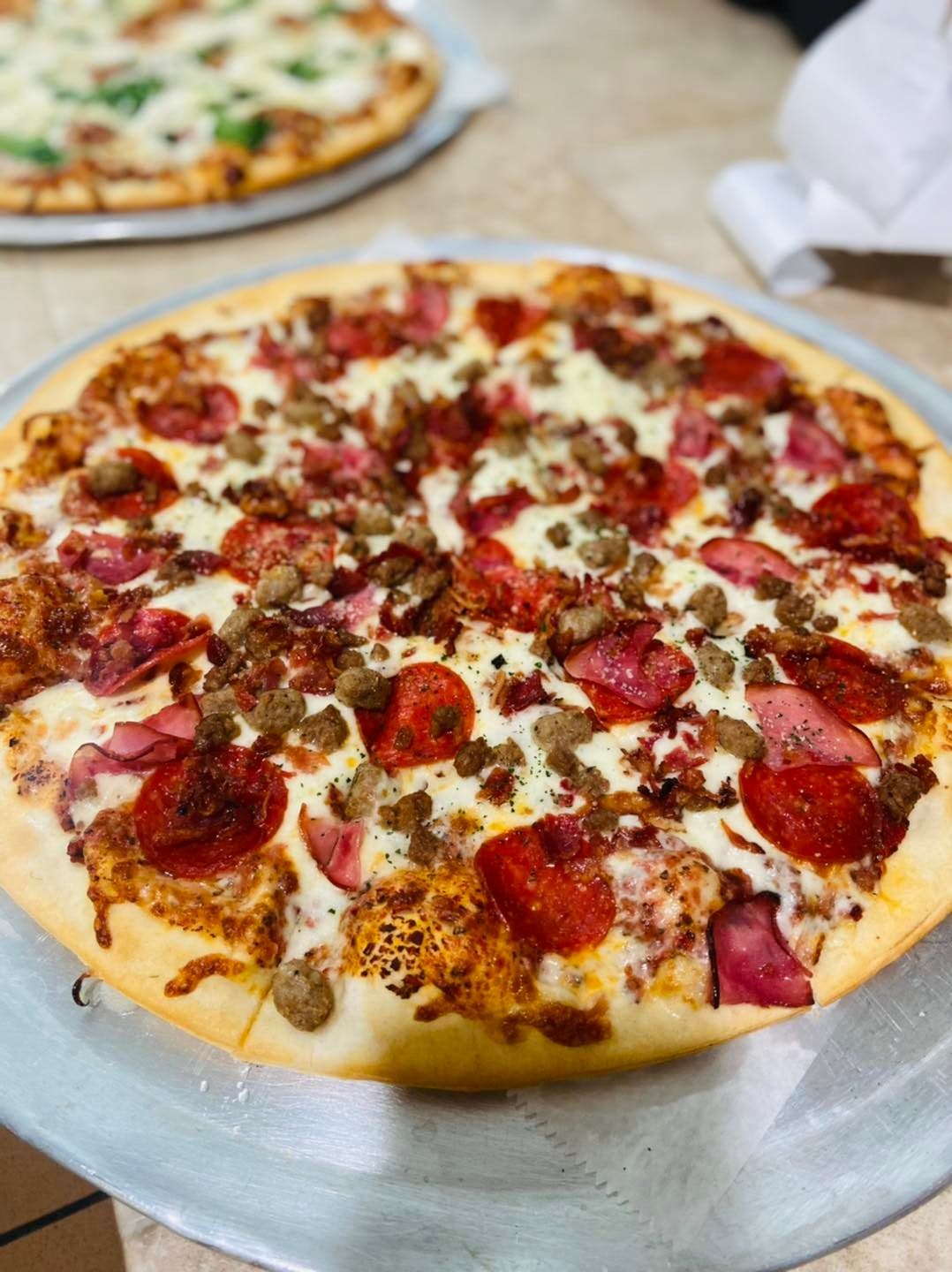 Order Meat Lover's Pizza - Small 14" (8 Slices) food online from Milantoni Italian Restaurant store, Bardstown on bringmethat.com