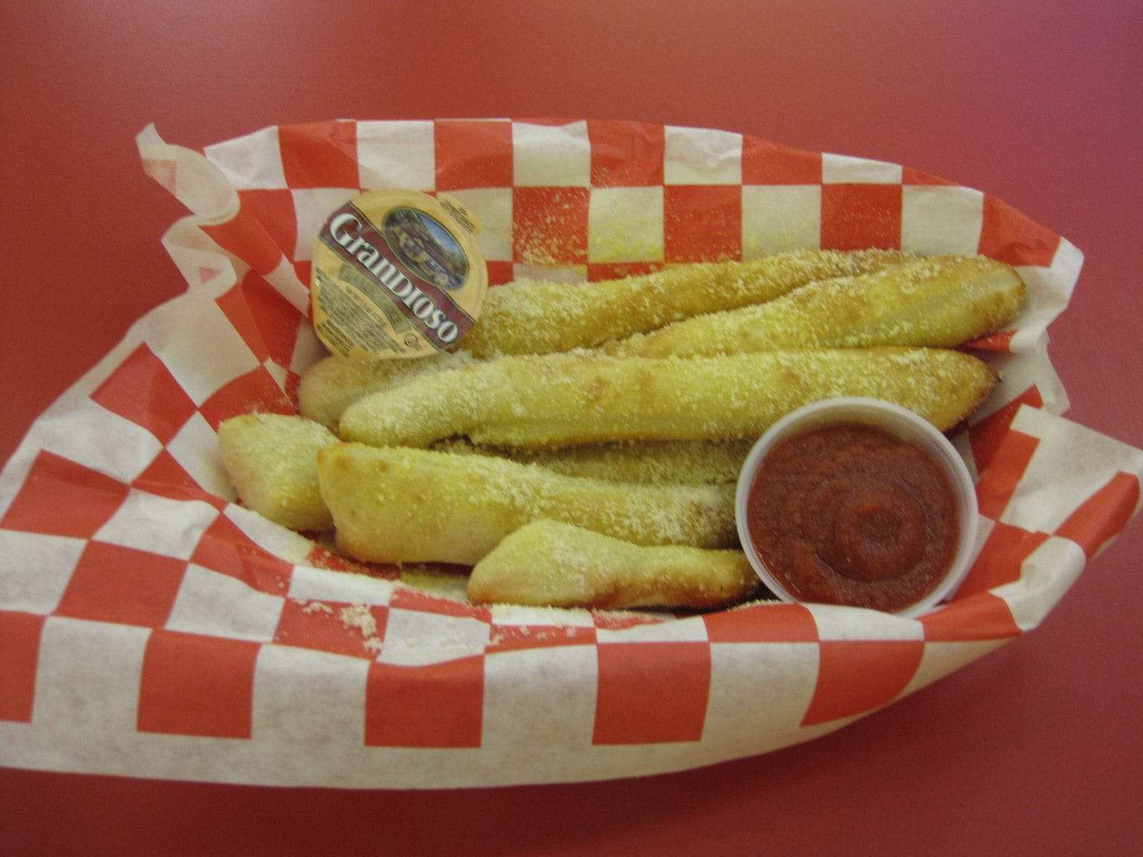 Order Breadsticks - Appetizer food online from Rocky's Pizzeria & Ice Cream store, North Chicago on bringmethat.com