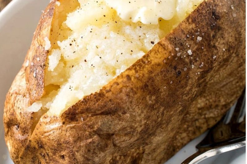 Order Baked Potato with Sour Cream food online from La esquina burritos & bar store, New York on bringmethat.com