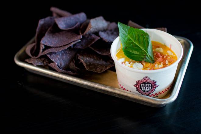 Order Red Curry Coconut Queso food online from Velvet Taco store, Tulsa on bringmethat.com